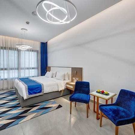 Abar Hotel Apartments Dip-1 Дубай Экстерьер фото