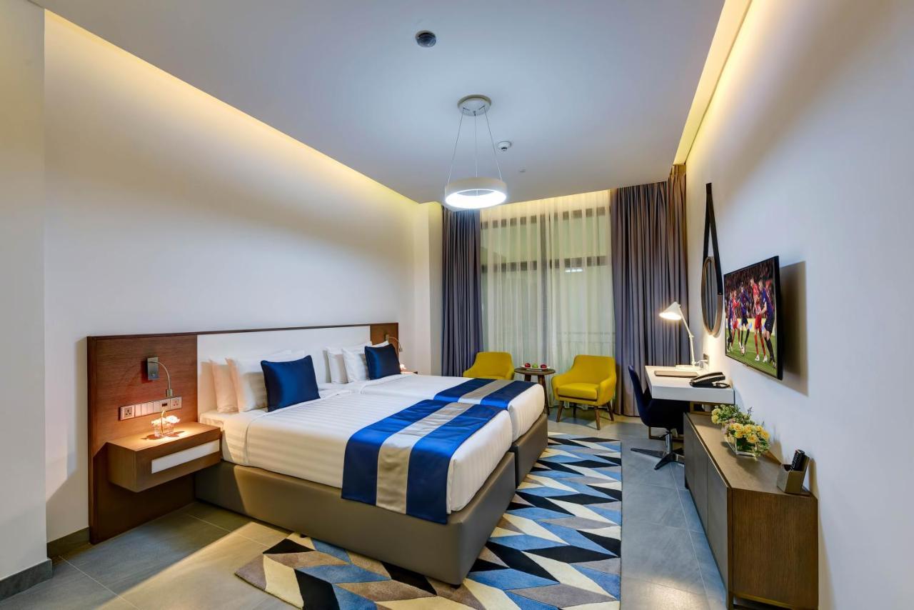 Abar Hotel Apartments Dip-1 Дубай Экстерьер фото