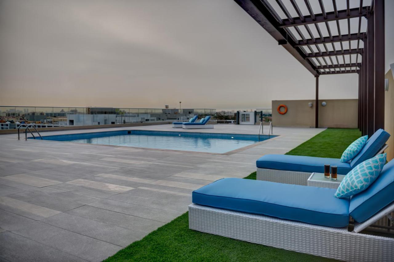 Abar Hotel Apartments Dip-1 Дубай Экстерьер фото