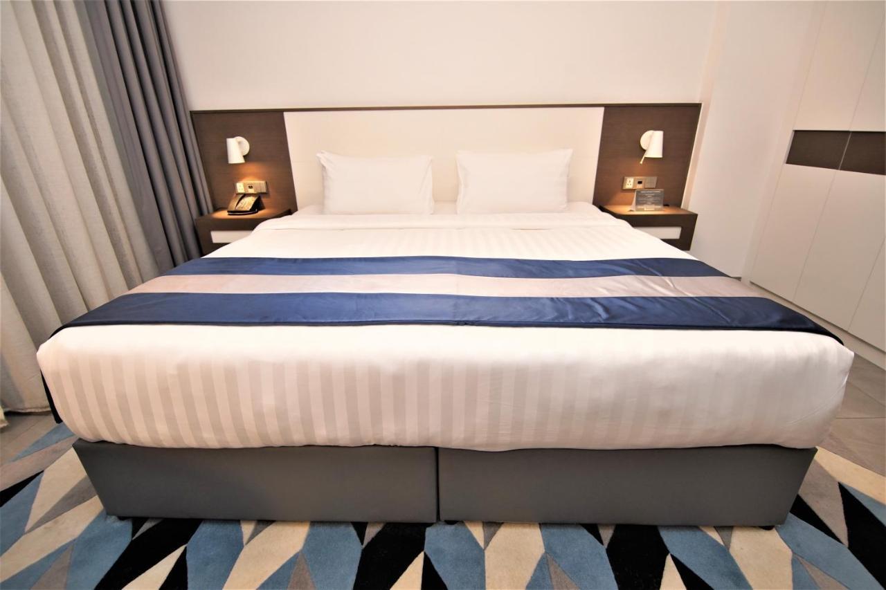 Abar Hotel Apartments Dip-1 Дубай Экстерьер фото
