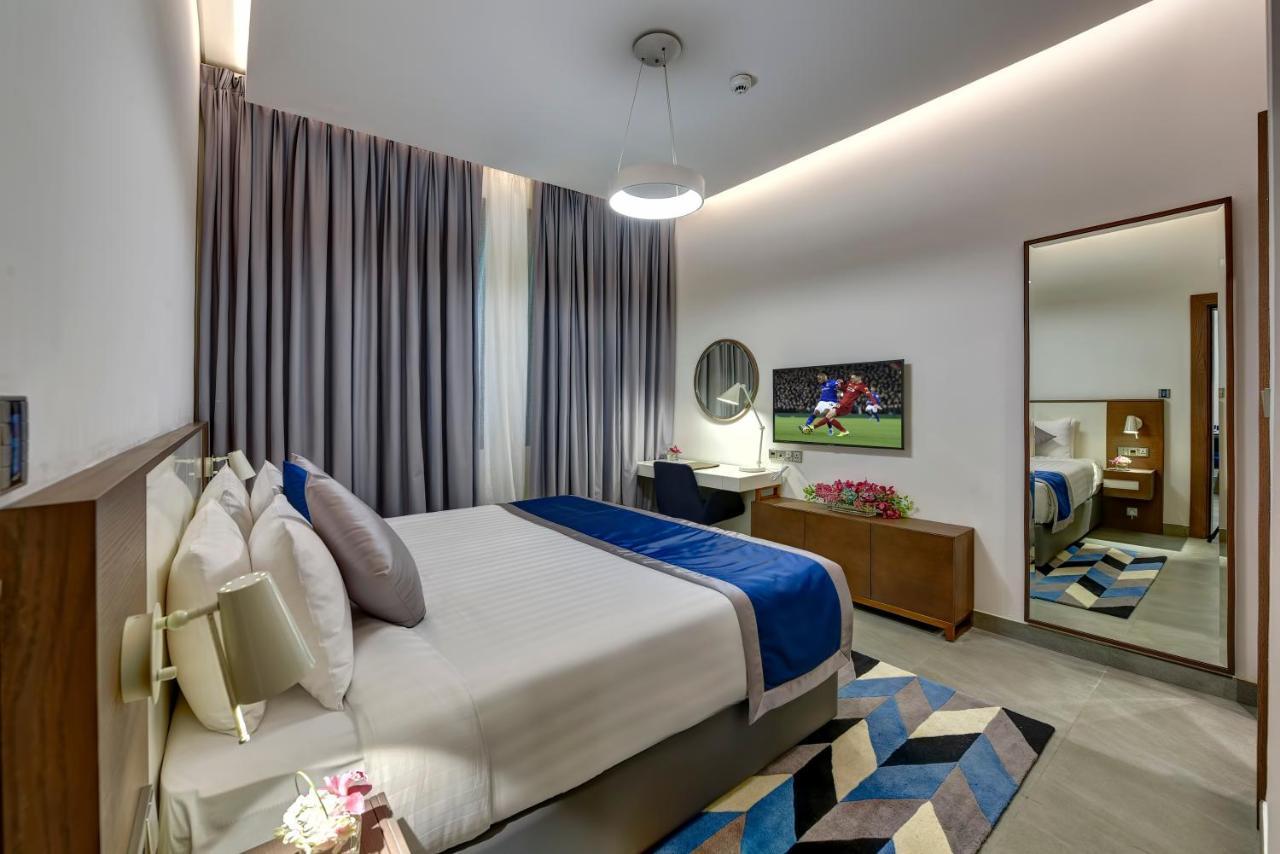 Abar Hotel Apartments Dip-1 Дубай Экстерьер фото