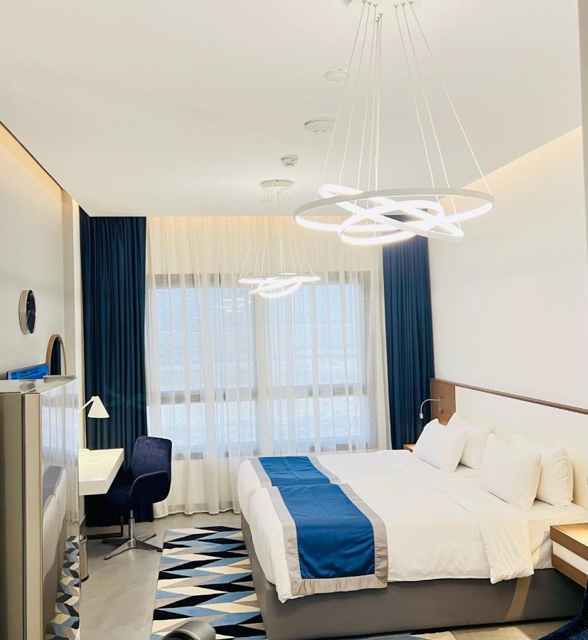 Abar Hotel Apartments Dip-1 Дубай Экстерьер фото