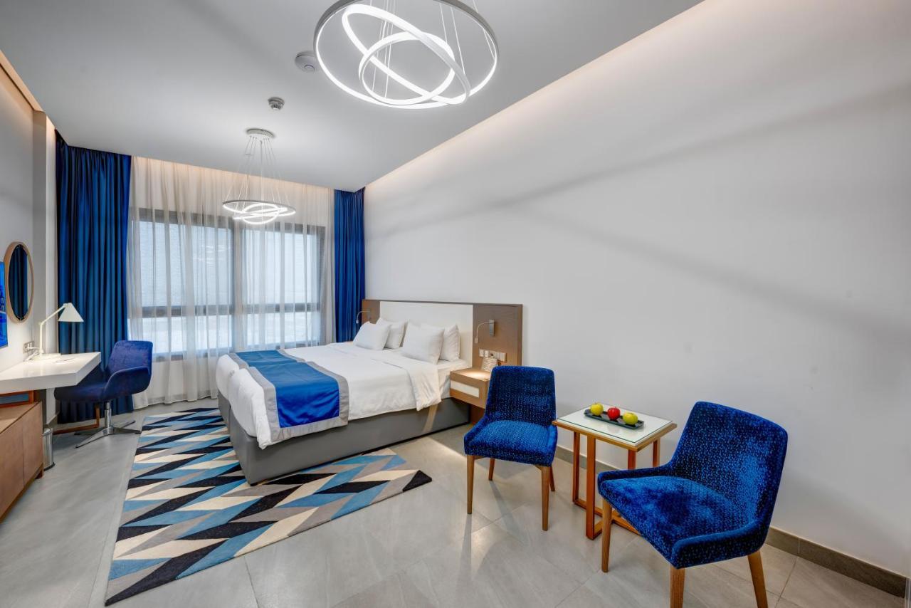 Abar Hotel Apartments Dip-1 Дубай Экстерьер фото