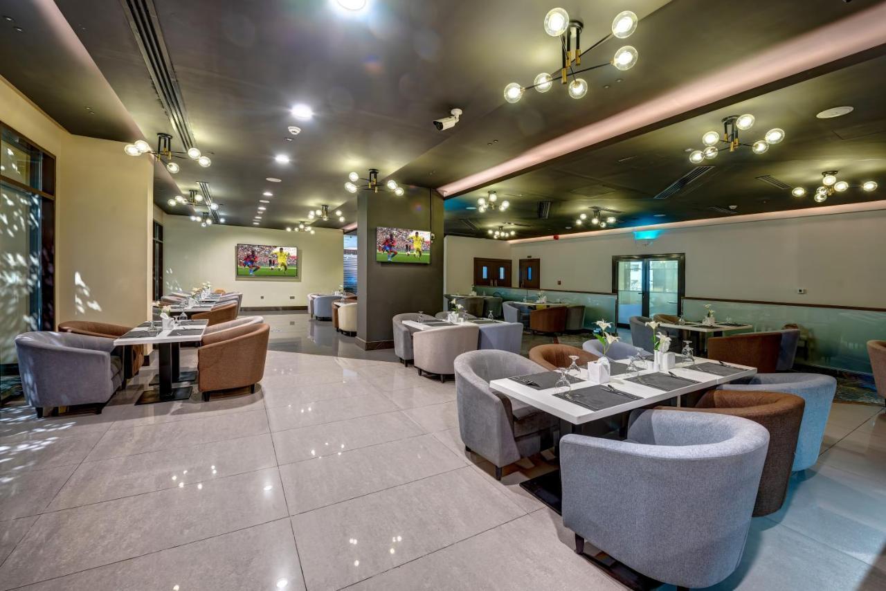 Abar Hotel Apartments Dip-1 Дубай Экстерьер фото